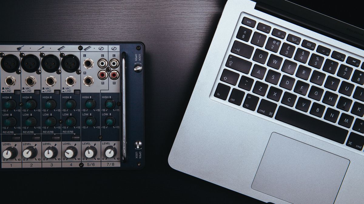 Laptop and professional audio mixer used for digital music production
