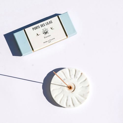 Free Stylish flat lay of incense box and holder with a minimalist design, perfect for aromatherapy. Stock Photo