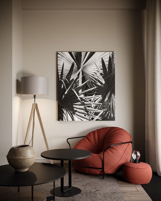 A cozy corner with stylish furniture, art, and warm lighting for a serene ambiance.