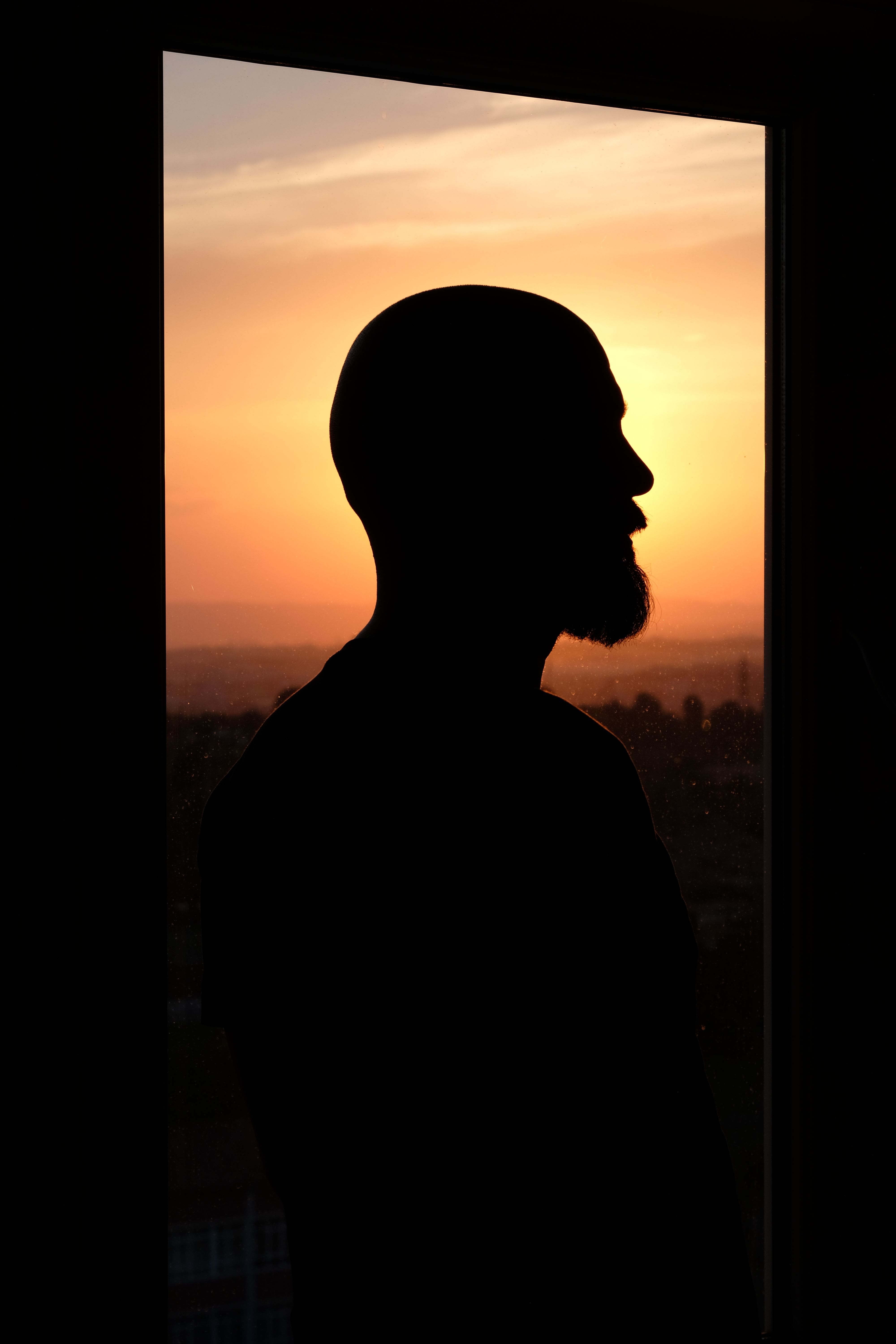 Silhouette of a Man During Sunset · Free Stock Photo
