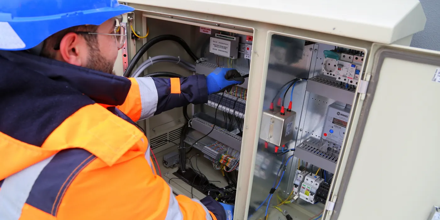 Field engineer working on equipment at a client site