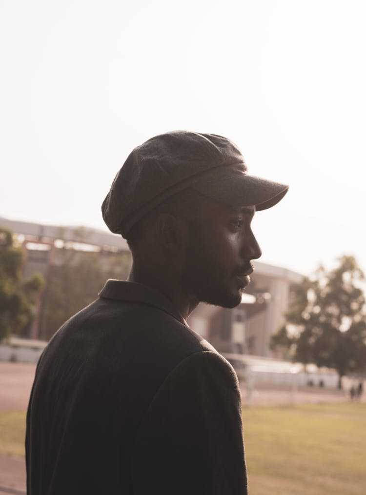 Profile Of A Man In A Cap 