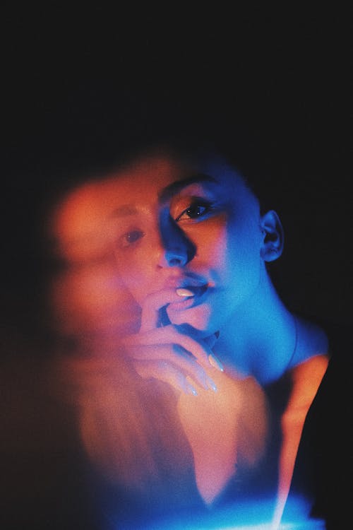 Artistic Portrait of a Woman in Split Lighting 