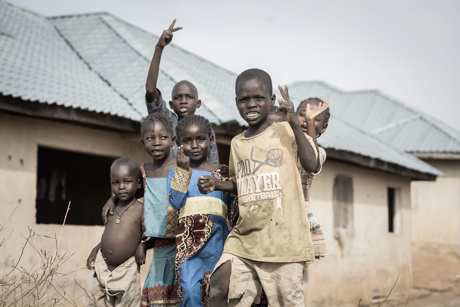 Group of children smiling in a Nigerian village