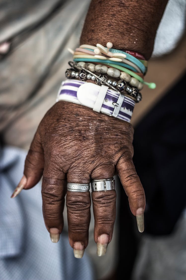 Old Woman Hand With Rings And Bracelets