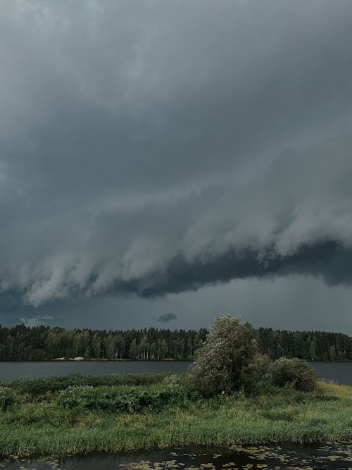 Picture of Lake under a Dark Cloudy Sky 