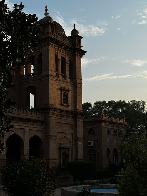 Free Historic university building in Peshawar, showcasing stunning architecture at sunset. Stock Photo