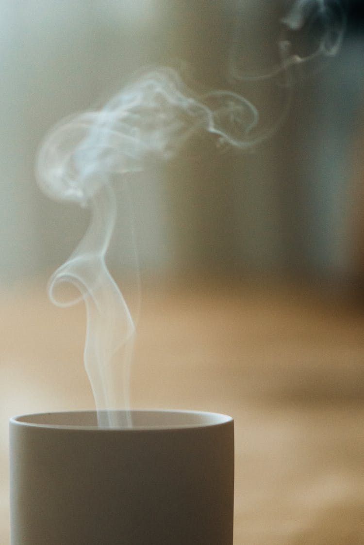 Smoke Over A Mug Of Hot Coffee