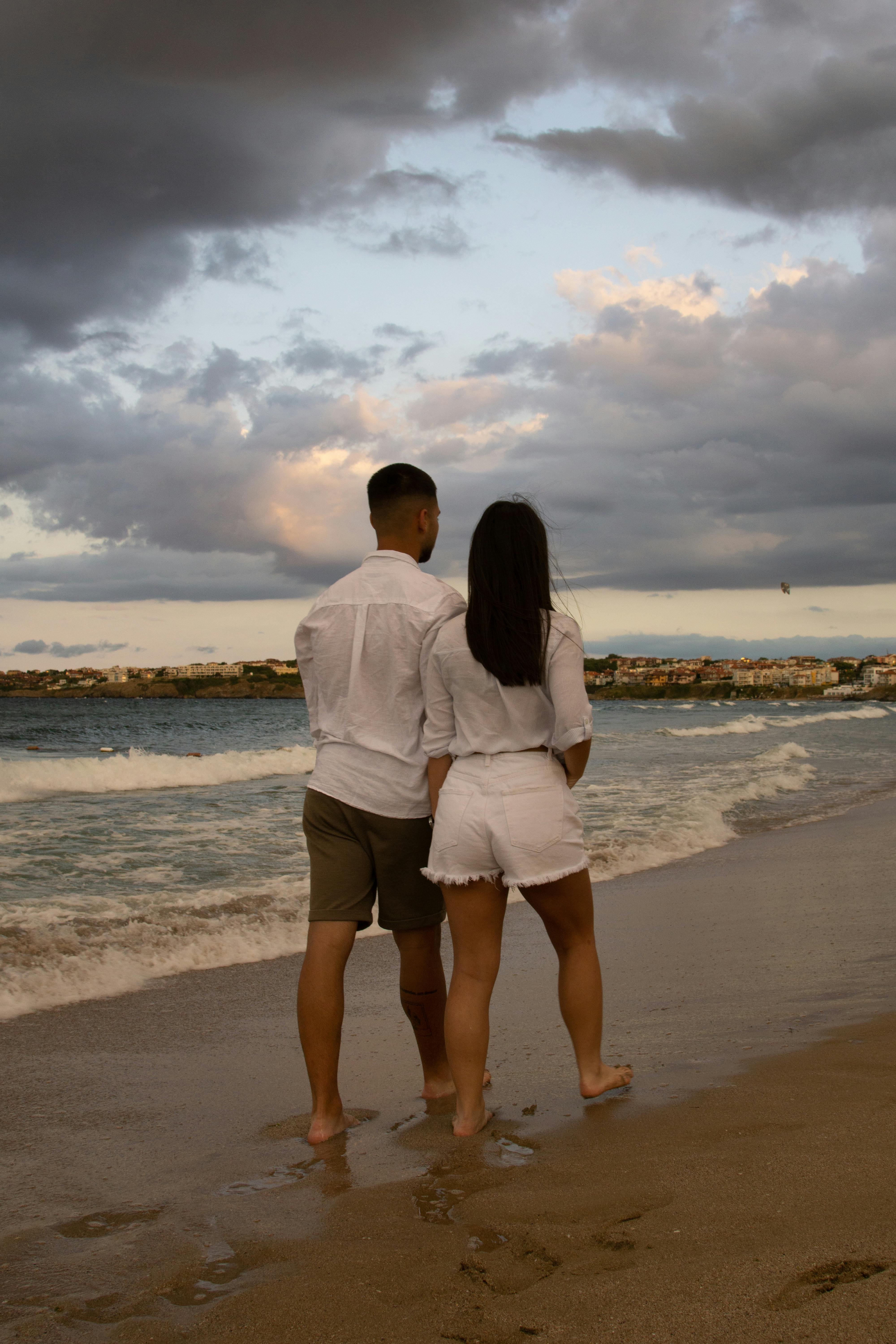 Couple in Shirts on Beach · Free Stock Photo