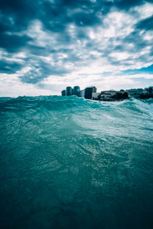 Gratis lagerfoto af bølger, bygninger, cancun