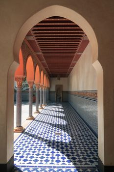 Explore the intricate architecture of an indoor Islamic colonnade in Berlin, Germany.