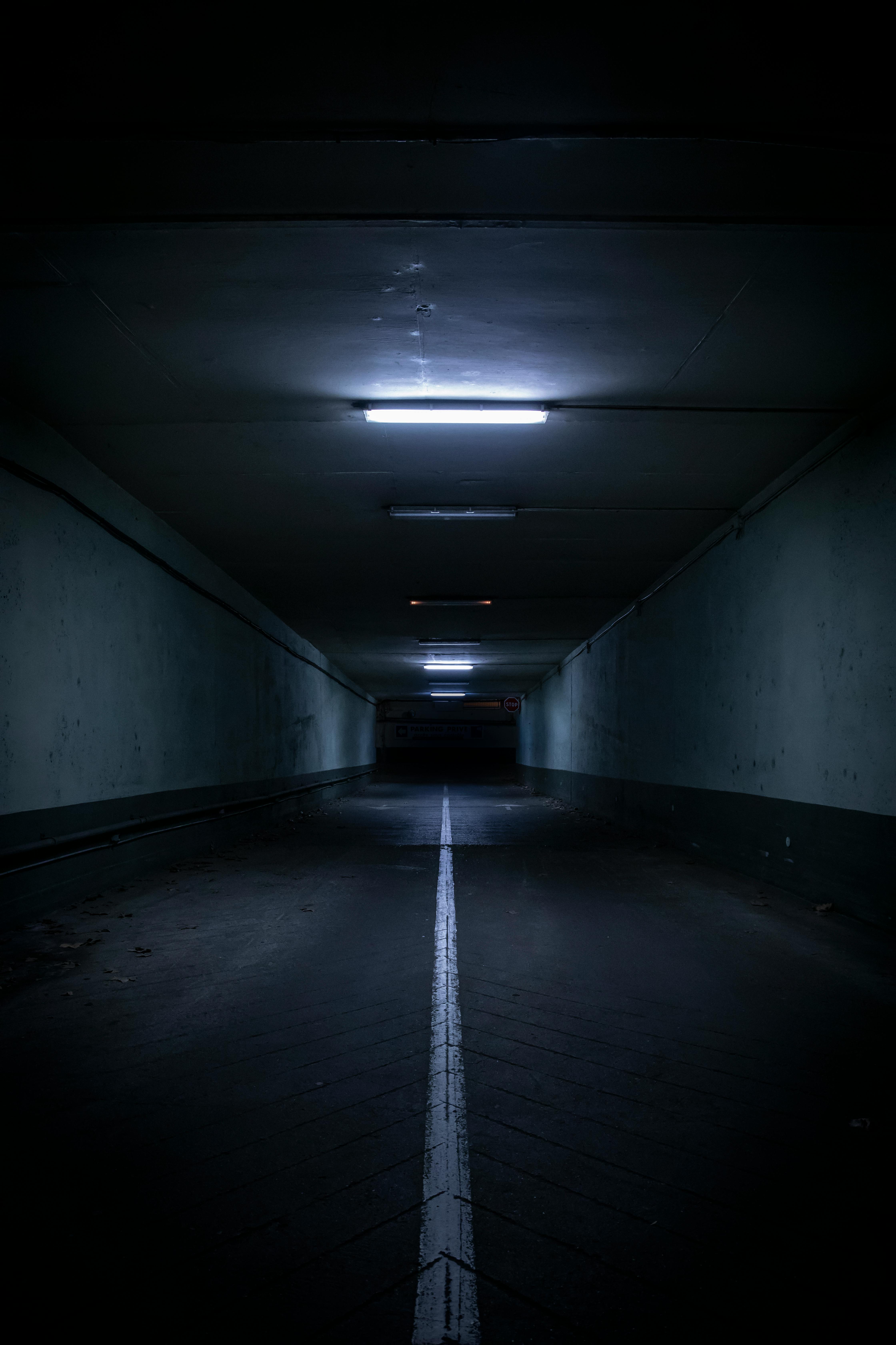 A subway train is traveling through a tunnel · Free Stock Photo