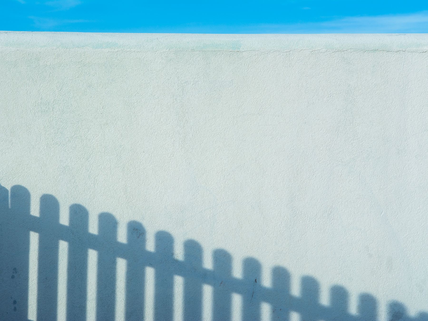 Fence and Decking Painting in Bellingham — woodwork brushed to a crisp, smooth line