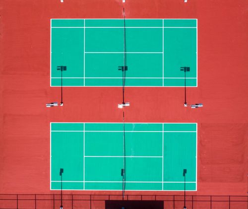 Aerial view of two tennis courts on a sunny day — Aidil Bahaman on Pexels