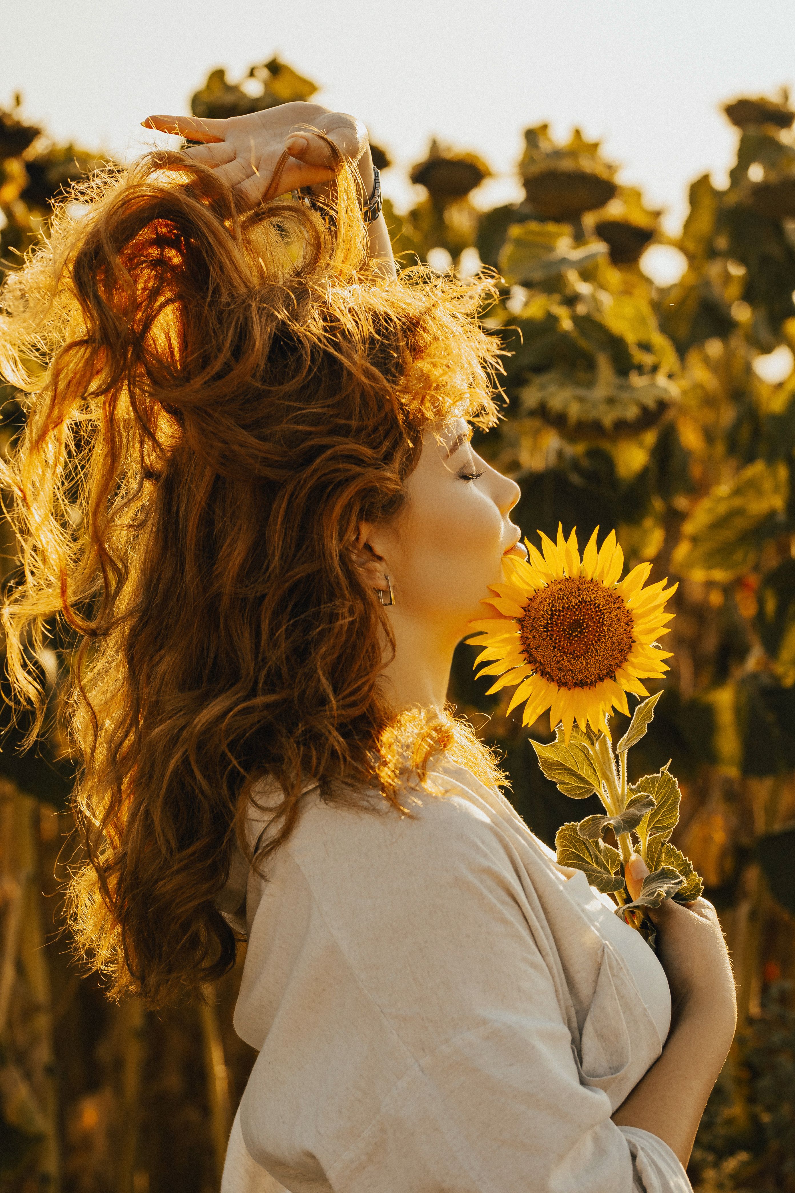 Woman with Sunflower · Free Stock Photo