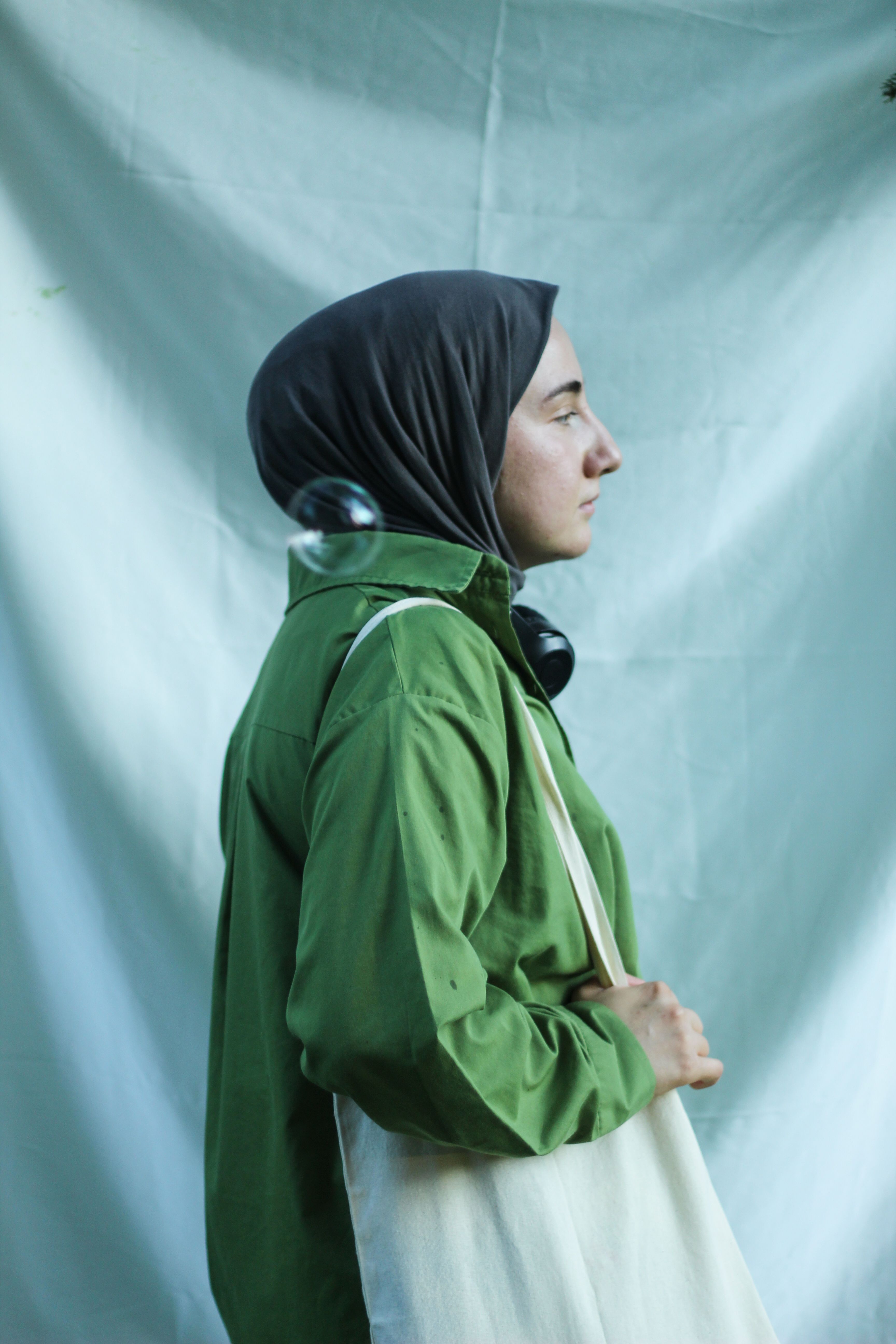 Woman in Hijab and Green Clothes · Free Stock Photo