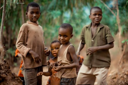 Free Smiling children playing outdoors in Bujumbura, Burundi, capturing joy and friendship. Stock Photo