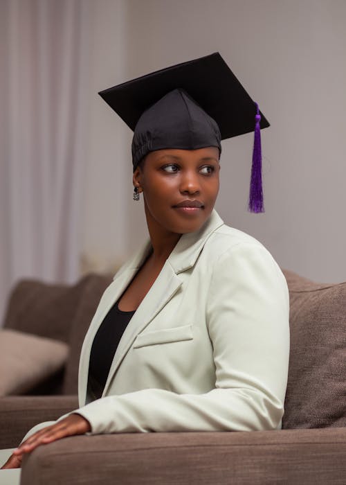 Sitting Graduate in Academic Hat