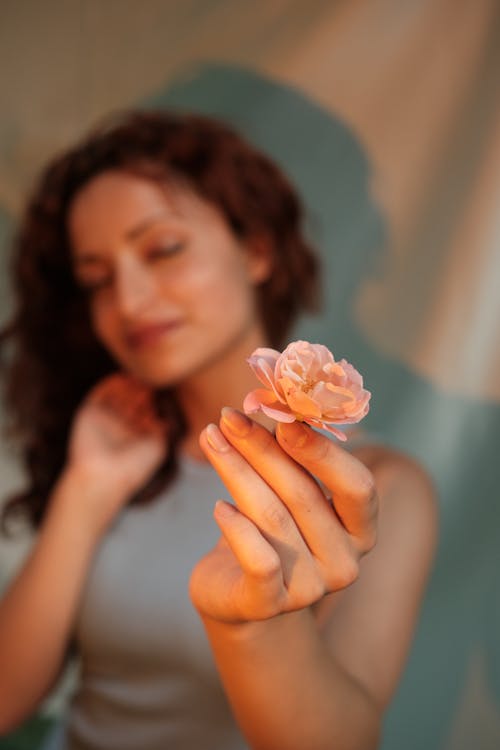 Flower in Woman Hand