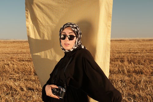 Woman in Hijab and Sunglasses