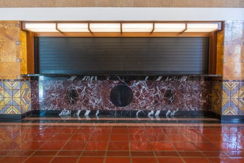 Free Art Deco counter featuring marble, decorative tiles, and wooden elements in a stylish interior. Stock Photo