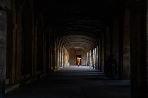 Person behind Corridor in Darkness