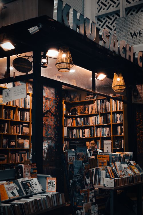 Free A warm, inviting view of a bookstore in Vietnam during the evening. Stock Photo