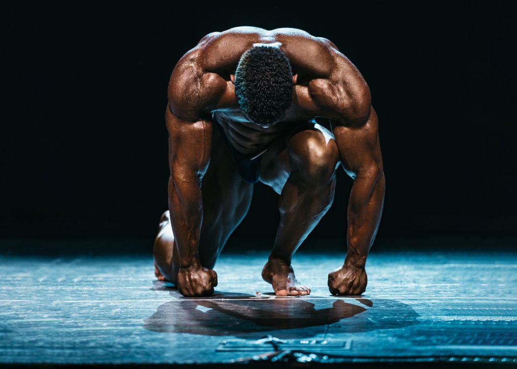 Muscled Man in Running Starting Position · Free Stock Photo