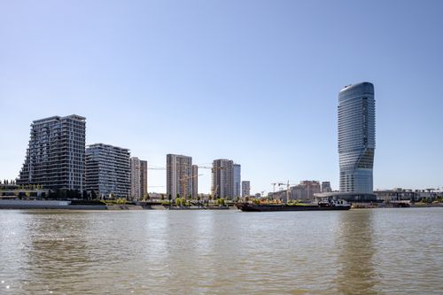 Free A view of the contemporary Belgrade cityscape with skyscrapers along the Danube River. Stock Photo