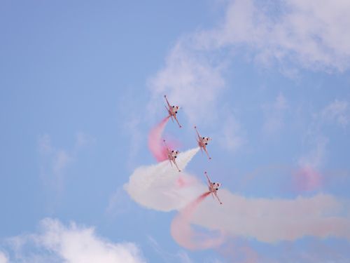 Free A stunning aerobatic display with smoke trails over a clear sky in Istanbul, Türkiye. Stock Photo
