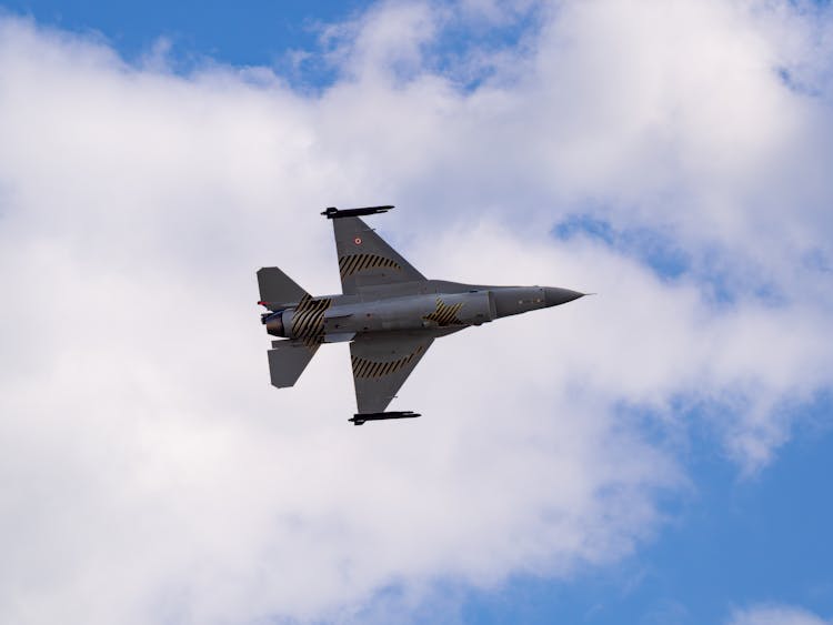 Military Airplane On Sky