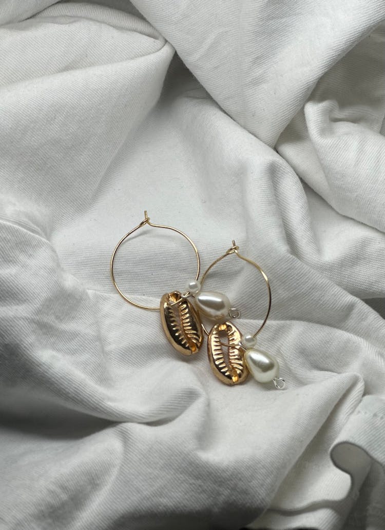 Earrings On A Bed