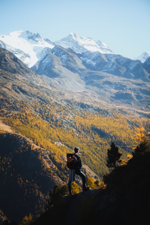 Man Standing On Cliff 