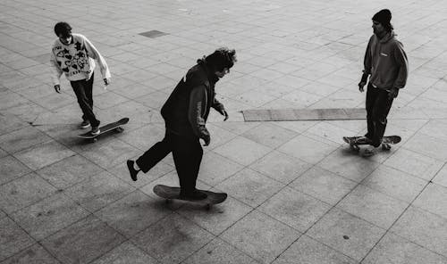 Skaters on Pavement in City