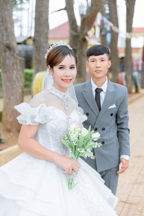 Smiling Newlyweds in Park