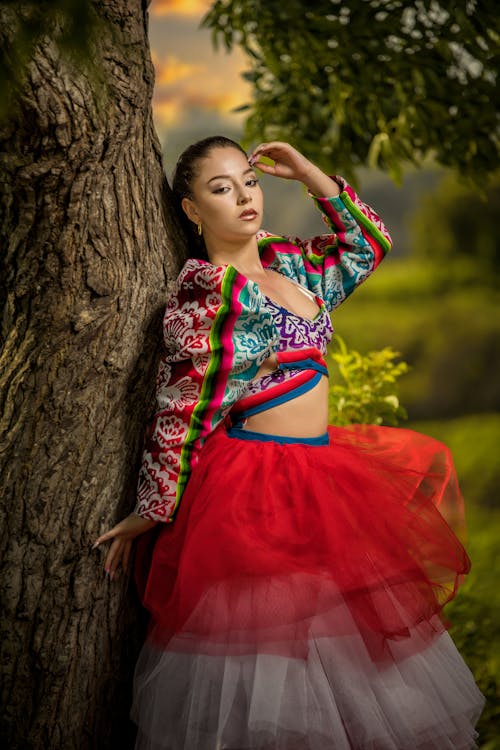 Dance in Traditional Dress by Tree