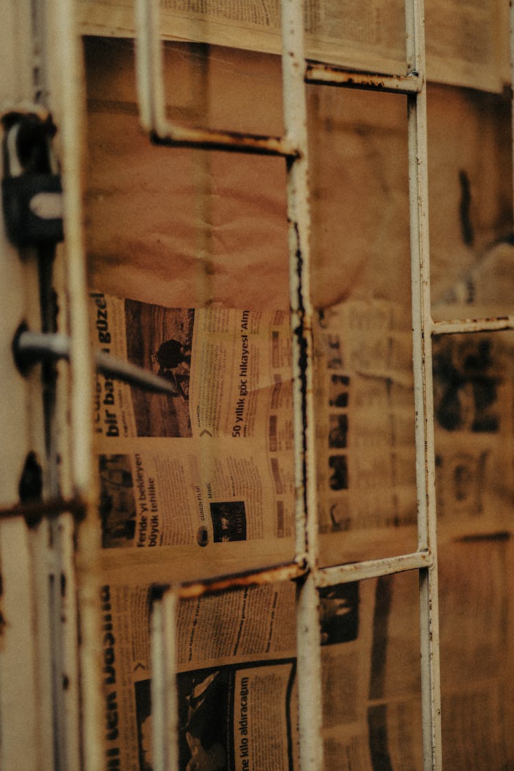 Old Newspapers Covering Door