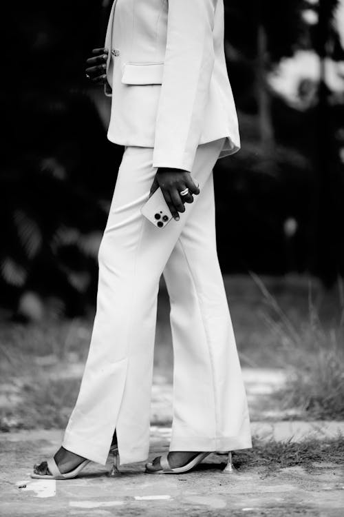 Businesswoman in White Suit
