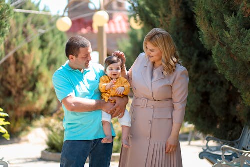 Parents with Their Child in Park