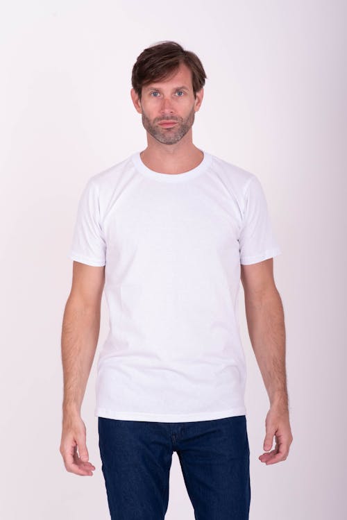 Standing Man in Jeans and White T-shirt