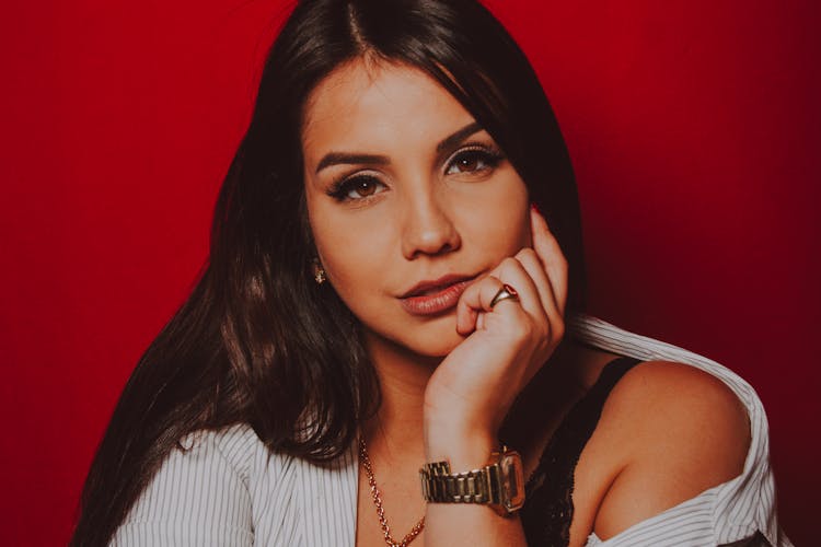 Portrait Of Woman On Red Background