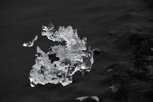 Close-up of a Piece of Ice on a Beach 