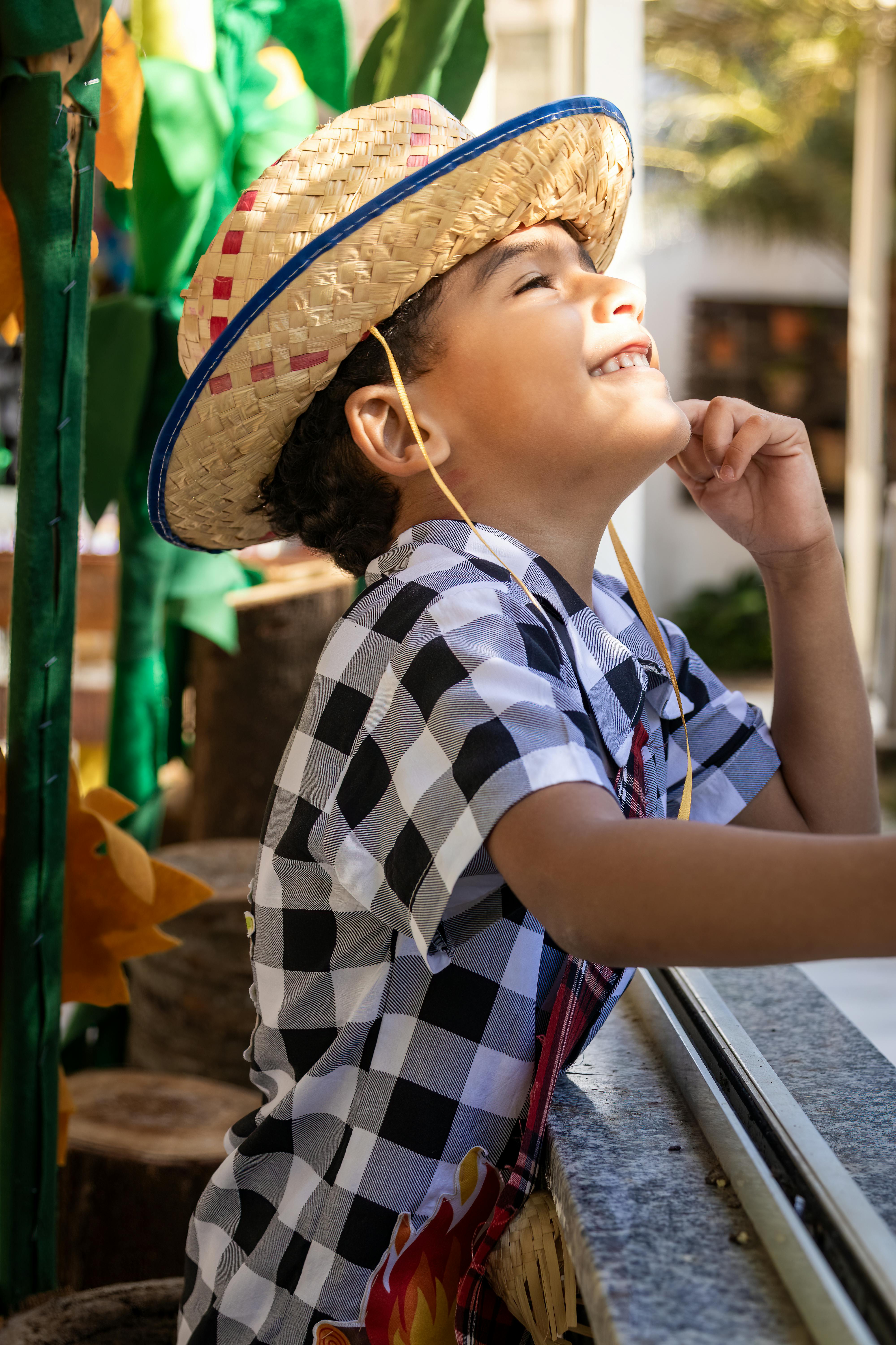 Boy Wearing a Straw Hat · Free Stock Photo