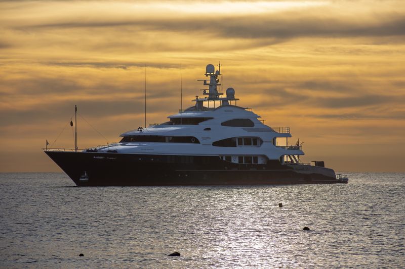 Luxury motor yacht at sunset