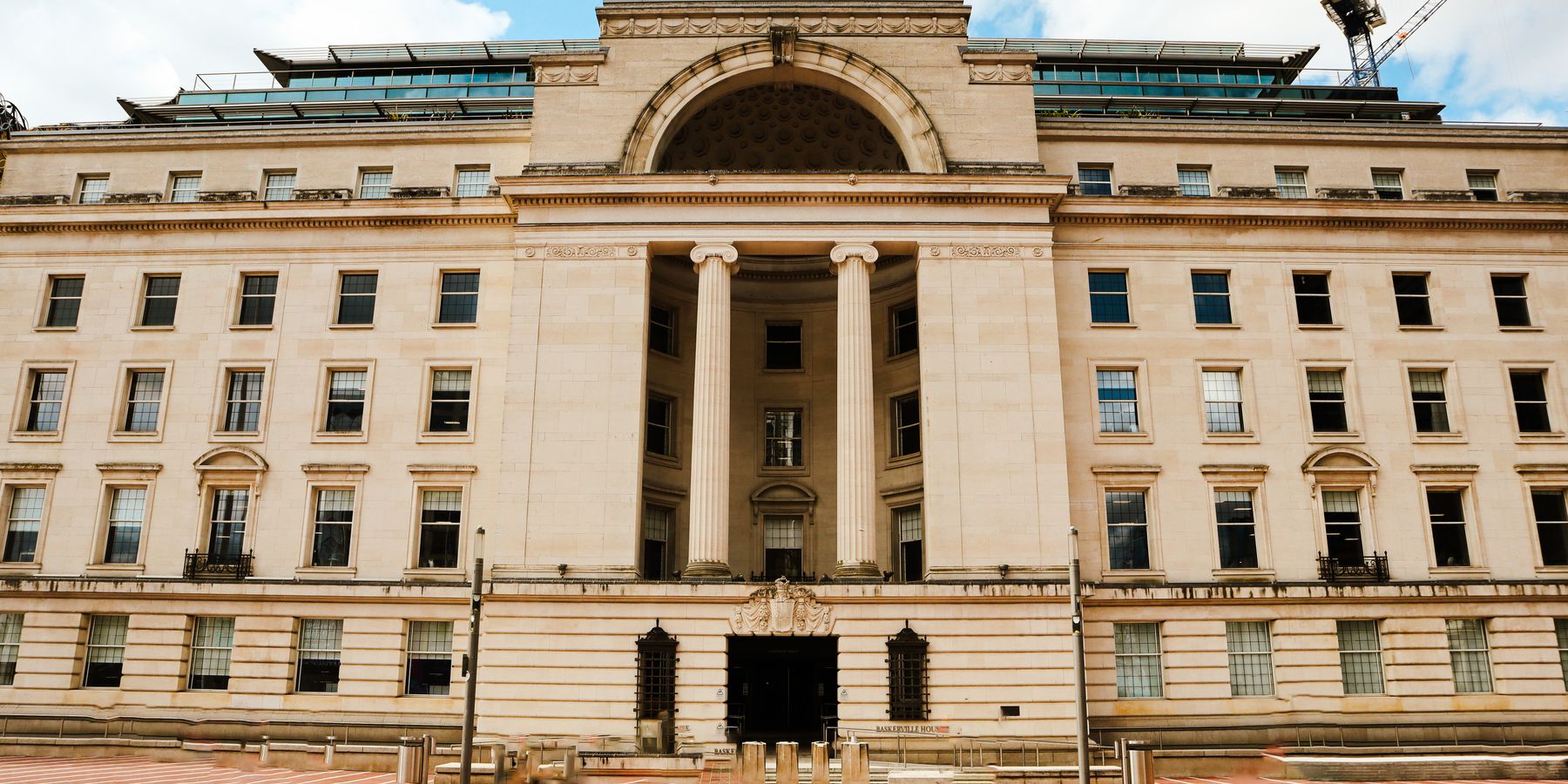 Exterior of Baskerville House, an iconic neoclassical building in Birmingham, UK.