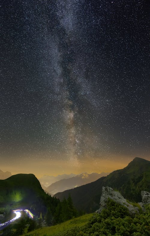 Stars on Night Sky over Hills