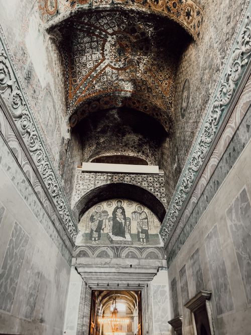 Free Intricate mosaics adorn the corridor of the Hagia Sophia in Istanbul, showcasing rich history. Stock Photo