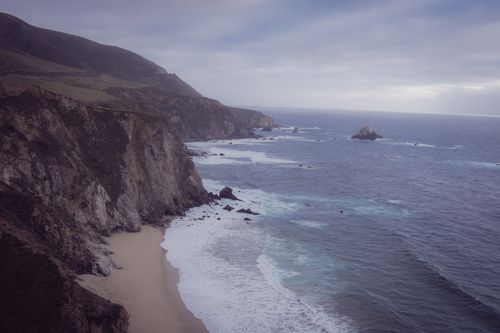 Free Breathtaking coastal view featuring cliffs and waves at Big Sur, California. Stock Photo