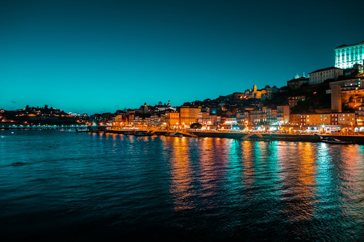 Illuminated Waterfront Buildings In Porto, Portugal