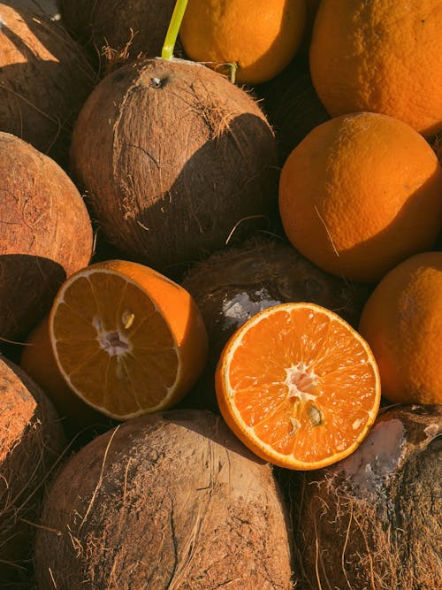 Pile of Coconuts and Oranges 